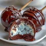 Delightful robins egg blue cake pops with speckled chocolate coating, perfect for Easter dessert tables.